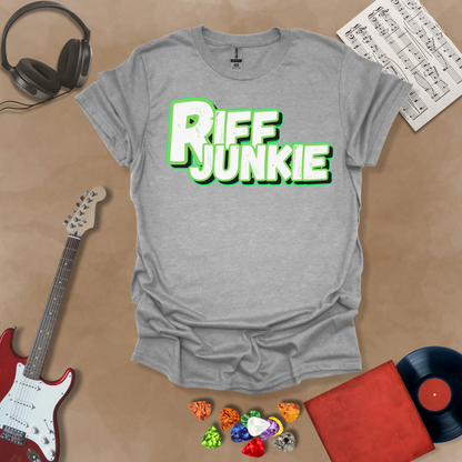 Gray T-shirt with Riff Junkie Logo in Light Glow Edition showing white and green outline logo with soft glow, perfect for light shirts and clean stage style.