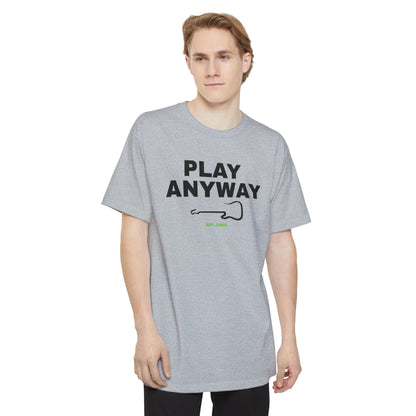 A man wearing a navy short-sleeve t-shirt with a graphic on the chest that reads 'PLAY ANYWAY' in beige block letters above a beige guitar outline and small green 'Riff Junkie' text, shown on a plain white background.
